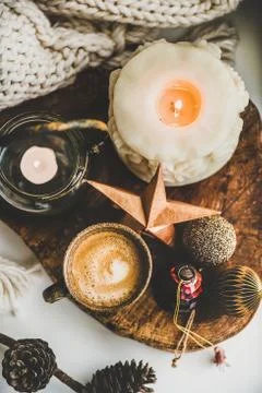 Flat-lay of Christmas composition with coffee, candles and decorative toys Stock Photos