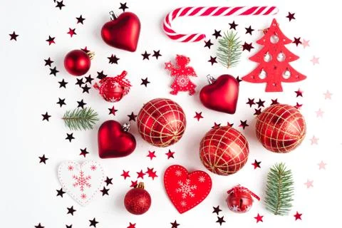 Flat lay Christmas composition with heart, branch, Christmas candy, stripes Photos