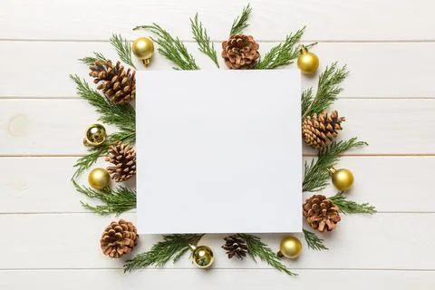 Flat lay Christmas composition. square Paper blank, pine tree branches, chris Stock Photos