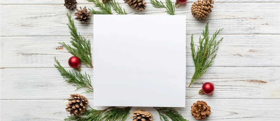 Flat lay Christmas composition. square Paper blank, pine tree branches, chris Stock Photos