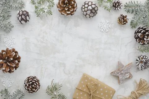 Flat lay christmas decoration composition. Frame made of fir branches, cones Stock Photos