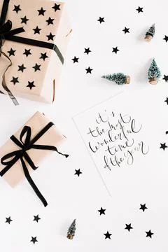 Flat Lay with Christmas Decorations and Gift with text "it's the most wonderf Stock Photos