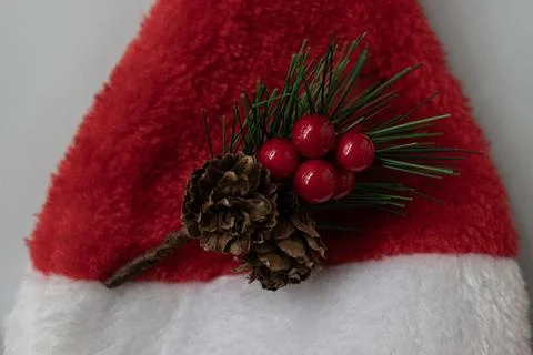 Flat Lay Christmas Table Setting with Santa Hat on Plate Against Red Backgrou Stock Photos