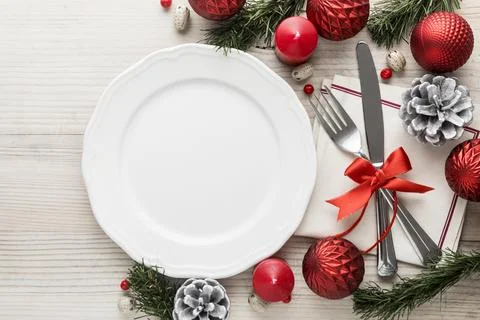 Flat lay christmas tableware with empty plate Stock Photos