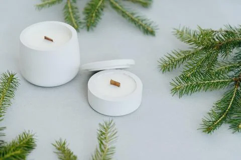 Flat Lay Christmas tree Branches and Candles on Light Gray Background. Place  Stock Photos