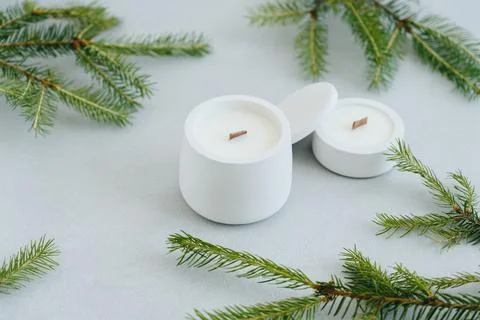Flat Lay Christmas Tree Branches and Candles on Gray Background. Place Under  Stock Photos