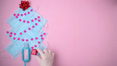 Flat lay with Christmas tree made from medical masks Stock Footage 164792986