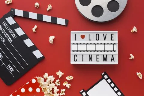 Flat lay cinema elements red background Stock Photos