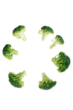 Flat lay circular composition with fresh green broccoli Stock Photos