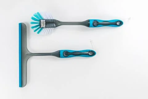 Flat lay of cleaning elements - brush and dryer isolated on white surface Stock Photos