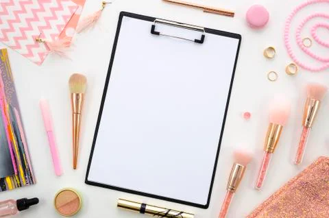 Flat lay clipboard mockup.Composition with cosmetics, makeup tools, on white Stock Photos