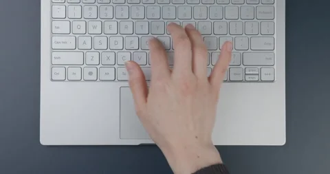 Flat lay. Close-up. Hands of a girl working on a laptop. Stock Footage 154693046