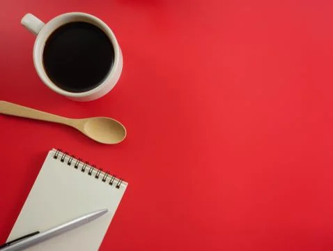 Flat lay coffee with notebook and pen Stock Photos