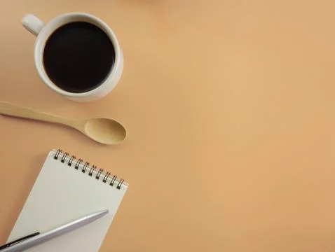 Flat lay coffee with notebook and pen Stock Photos