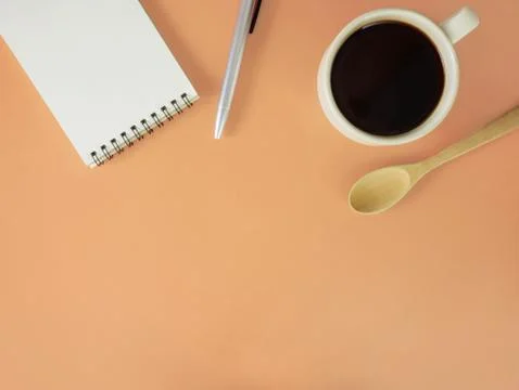 Flat lay coffee with notebook and pen Stock Photos