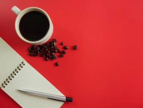 Flat lay coffee with notebook and pen Stock Photos