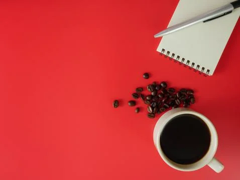 Flat lay coffee with notebook and pen Stock Photos