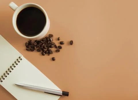 Flat lay coffee with notebook and pen Stock Photos