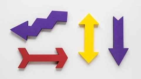 Flat lay colorful set arrows white background Stock Photos