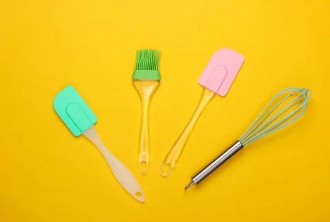 Flat lay compoisition of kitchen tools on yellow background. Minimalism. Top  Stockfoto's