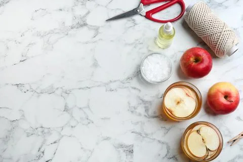 Flat lay composition with apple candles on marble background. Space for text Stock Photos