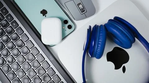 Flat lay composition: Apple Mac mini with apple silicon m2 pro chip. Gray Stock Photos