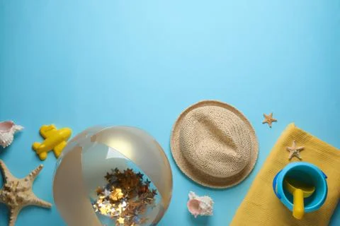 Flat lay composition with ball and beach objects on light blue background, sp 写真素材