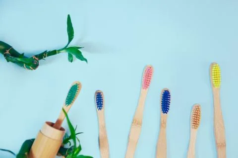 Flat lay composition with bamboo toothbrush and space for text Stock Photos