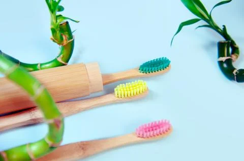 Flat lay composition with bamboo toothbrush and space for text Stock Photos