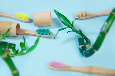 Flat lay composition with bamboo toothbrush and space for text Stock Photos