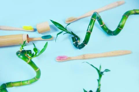 Flat lay composition with bamboo toothbrush and space for text Stock Photos