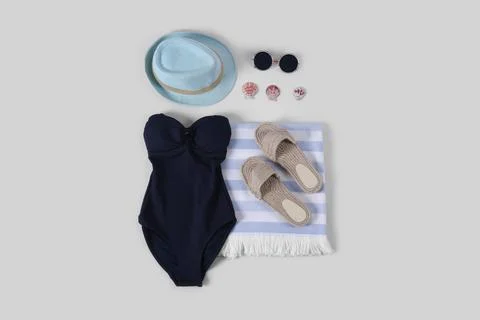 Flat lay composition with beach accessories on white background Foto stock