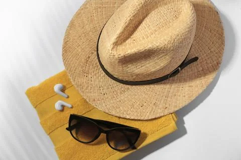 Flat lay composition with beach accessories on white background Foto stock