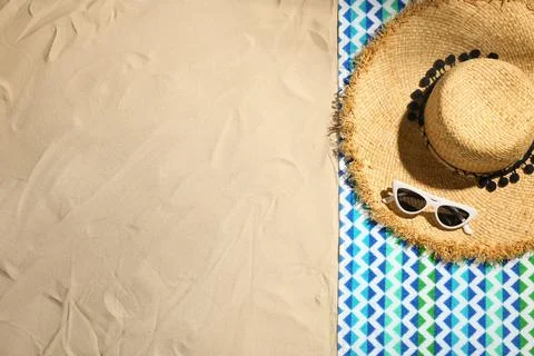 Flat lay composition with beach objects and space for text on sand 스톡 사진