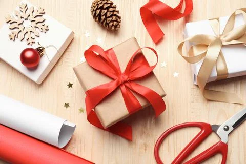 Flat lay composition with beautiful Christmas gift boxes and wrapping paper.. Stock Photos