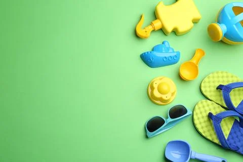 Flat lay composition with bright beach toys on color background. Space for te 写真素材