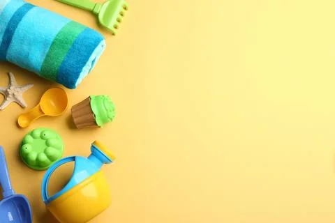 Flat lay composition with bright beach toys on color background. Space for te 写真素材