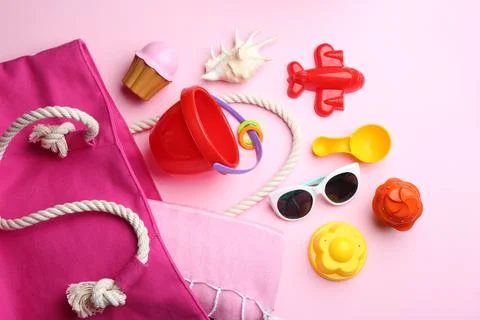 Flat lay composition with bright beach toys on color background 写真素材