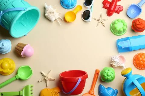 Flat lay composition with bright beach toys on color background. Space for te 写真素材