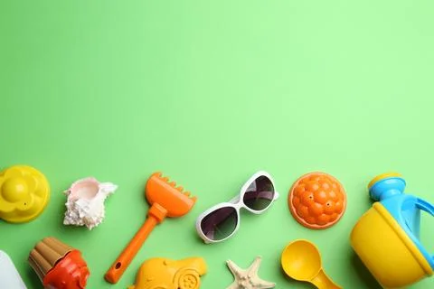 Flat lay composition with bright beach toys on color background. Space for te 写真素材