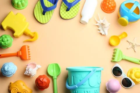 Flat lay composition with bright beach toys on color background. Space for te 写真素材