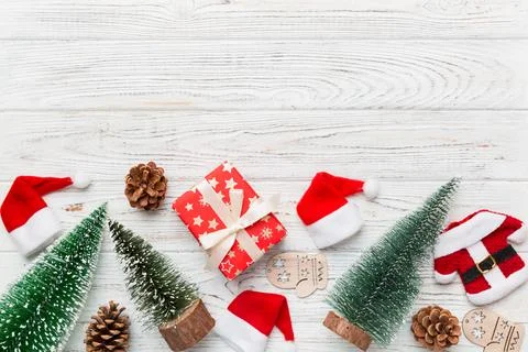 Flat lay composition with christmas trees on color background. Top view with  Stock Photos