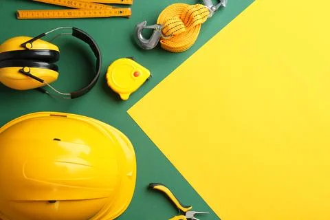 Flat lay composition with construction tools on color background, space for t Fotos de archivo