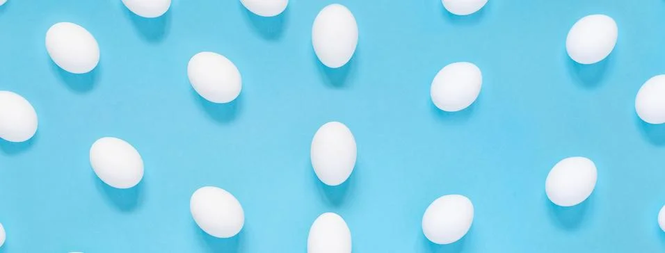 Flat lay composition of creative Easter bunny ears on blue background, space  Photos