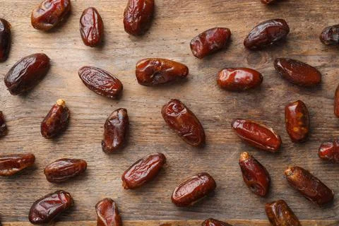Flat lay composition with dates on wooden background. Dried fruit as healthy  스톡 사진
