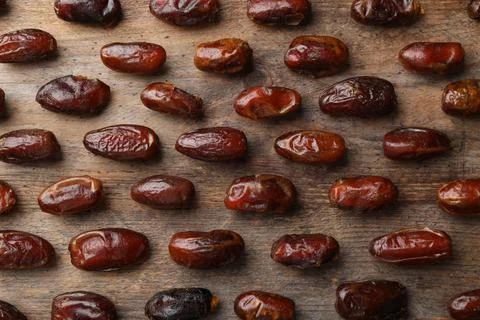 Flat lay composition with dates on wooden background. Dried fruit as healthy  스톡 사진
