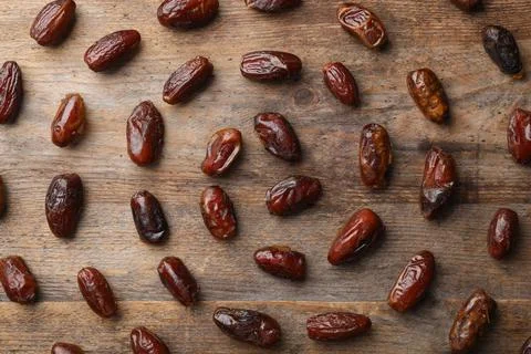 Flat lay composition with dates on wooden background. Dried fruit as healthy  스톡 사진