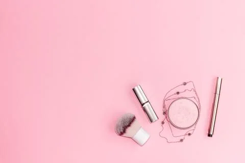 Flat lay composition with decorative makeup products and gold chain necklace on Stock Photos