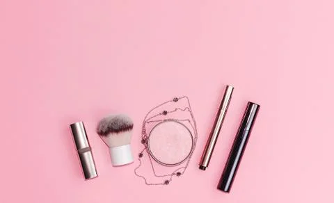 Flat lay composition with decorative makeup products and gold chain necklace on Stock Photos