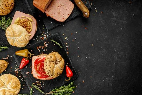 Flat lay composition of delicious hot dogs and sandwiches with different Stock Photos